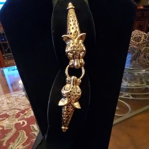 Elastic Black Belt with Gold Metal Jaguar Buckle.